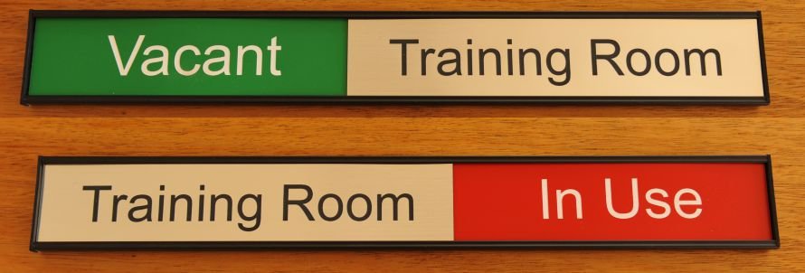 Training room sign with red and green highlight